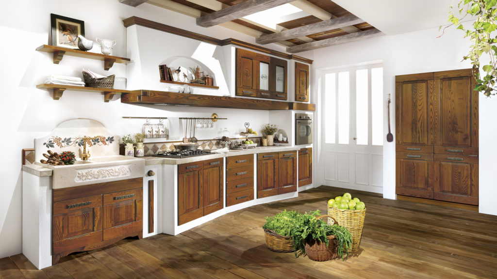 nadem cucina in muratura, muretti bianchi e anta modello fiamma